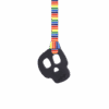 Black skull chew necklace on retro stripes leaves lanyard