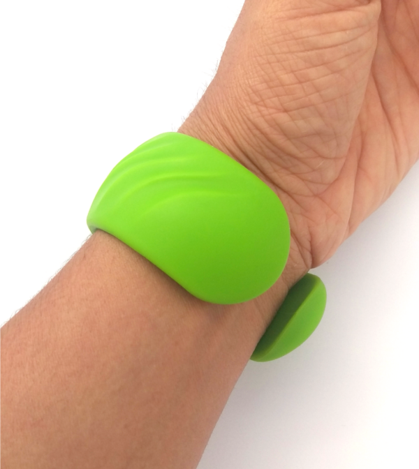 Green Ripple Bracelet sensory chew on a wrist showing open side