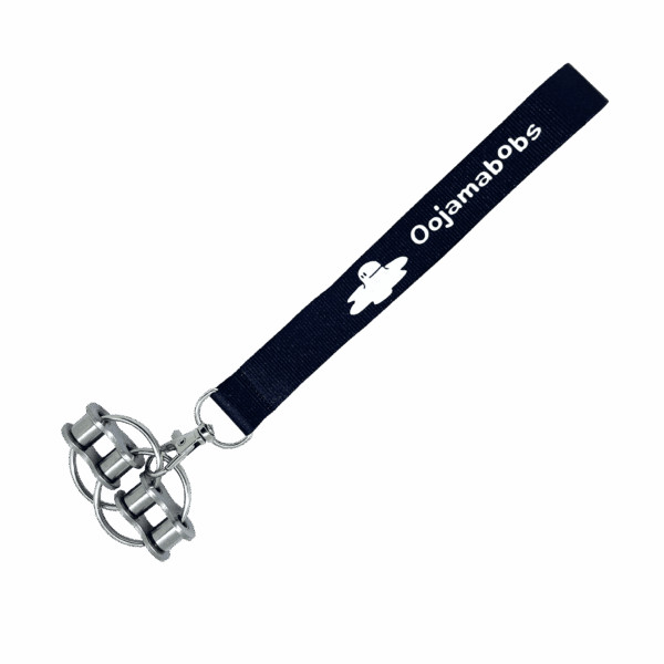 Large Fidgi-Flip fidget toy on wrist lanyard