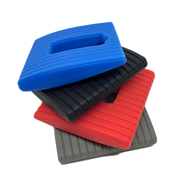 Different colour square chew necklaces in a pile