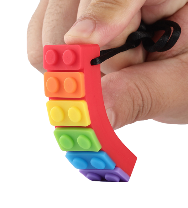 Rainbow brick chew necklace in red on black cord