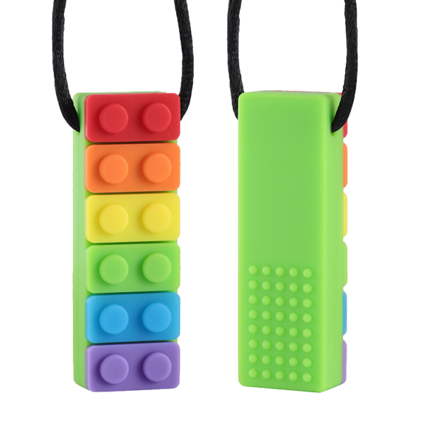 Front and reverse face of a Rainbow brick chew necklace in green on black cord