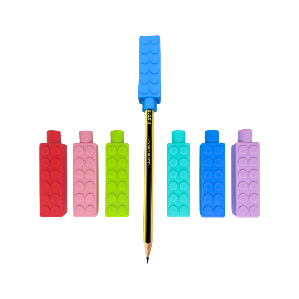 brick pencil topper chews 6 chewy brick pencil toppers in red, blue, pink, purple, turquoise and green, one blue chew is on a pencil