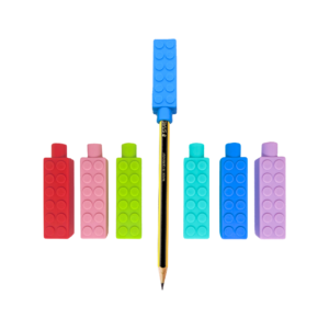 brick pencil topper chews 6 chewy brick pencil toppers in red, blue, pink, purple, turquoise and green, one blue chew is on a pencil