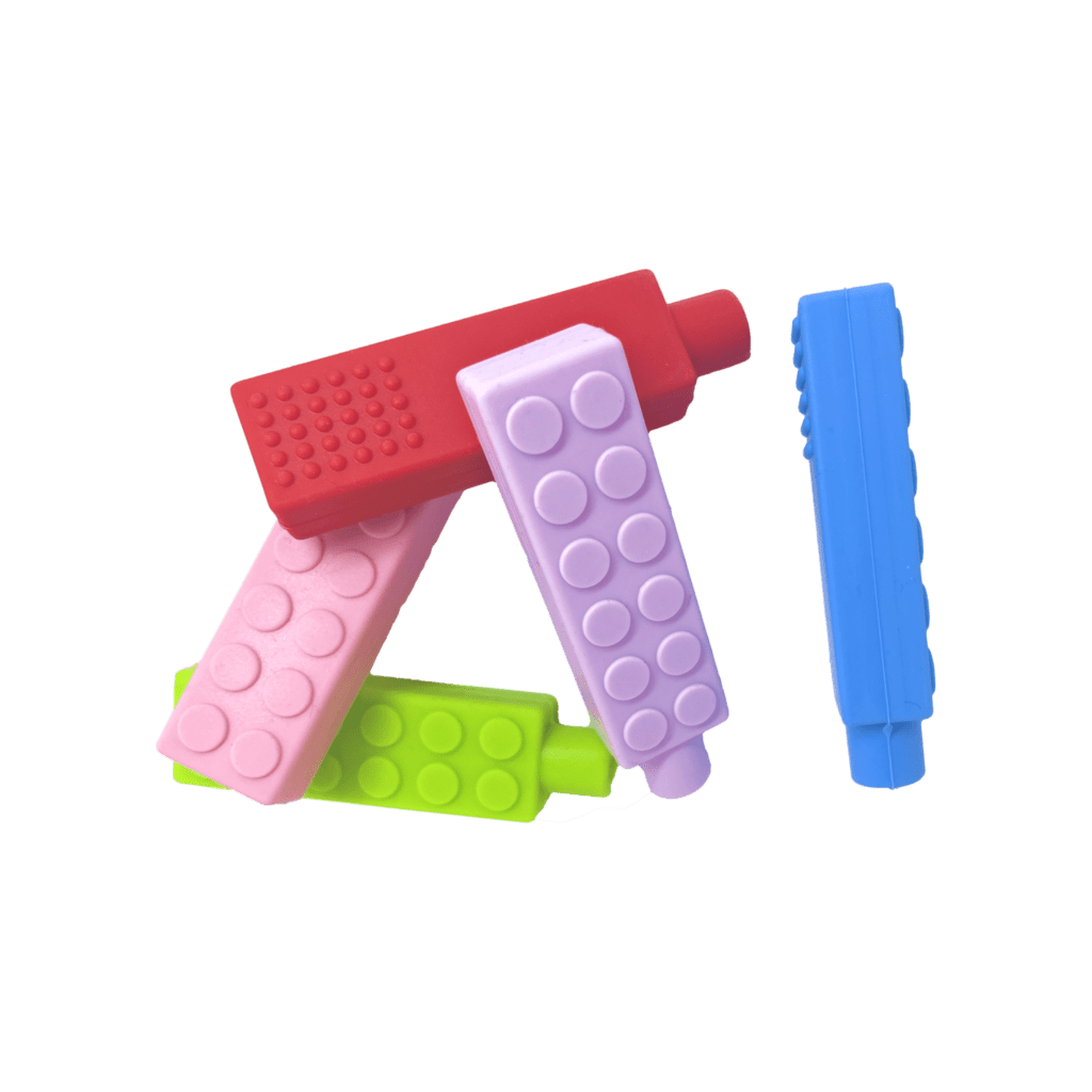 5 chewy brick pencil toppers in red, blue, pink, purple and green