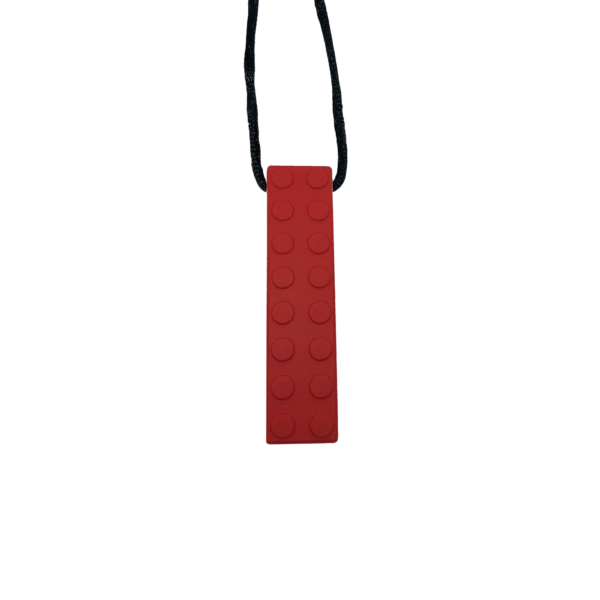Brick chew necklace in red on black cord, perfect for sensory needs