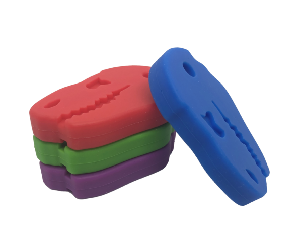 Dinosaur chew necklace colour range in a stack, ideal sensory chews
