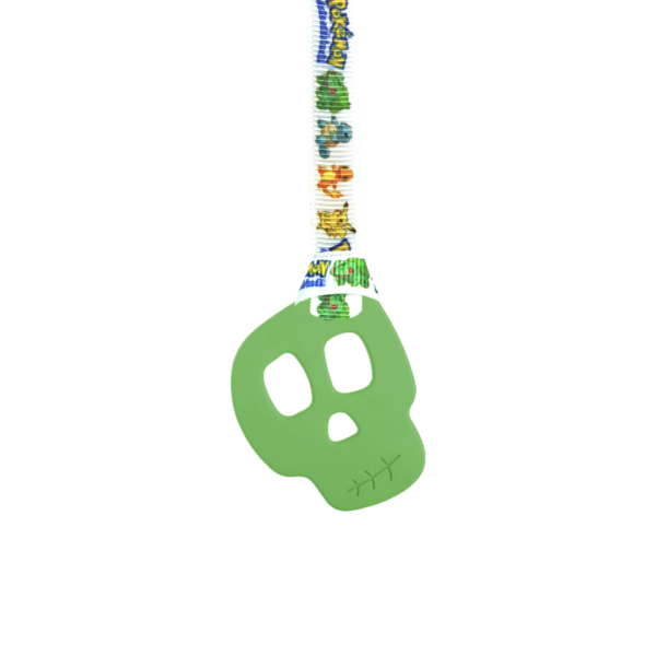 Green skull chew necklace on pokemon lanyard