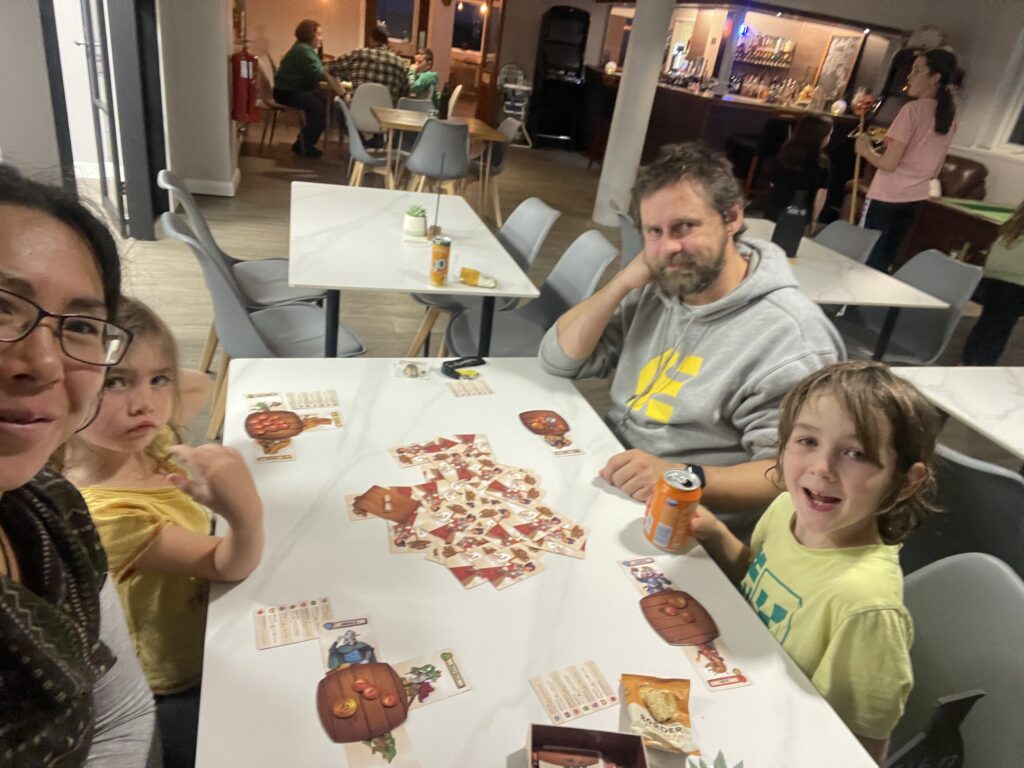 Family playing a board game