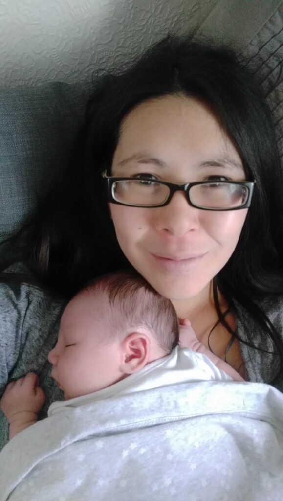 mother with sleeping baby