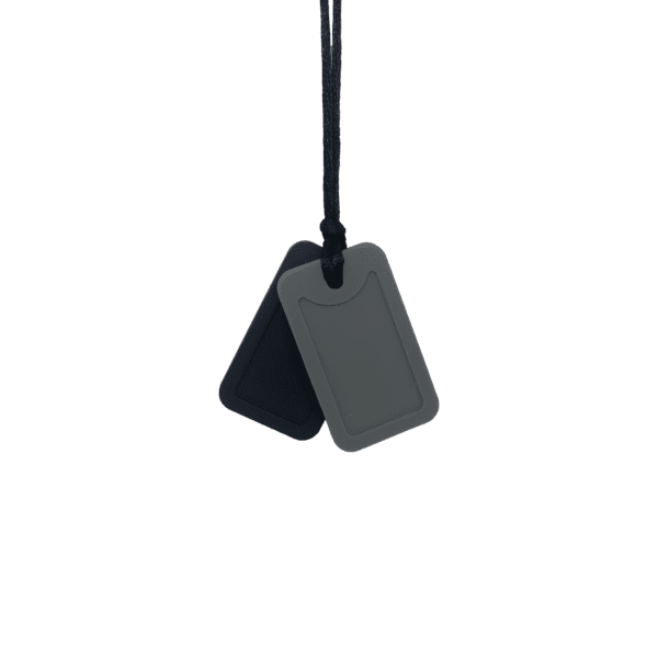 Black and grey dog tag sensory chew necklace pair on black cord